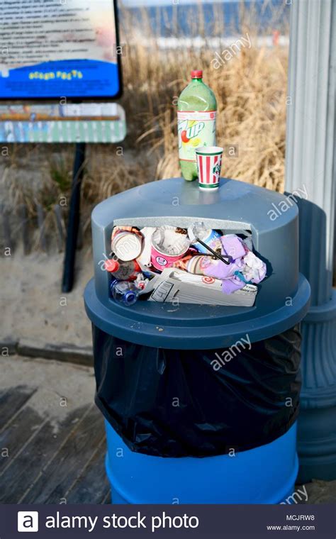 Full Trash Can High Resolution Stock Photography And Images Alamy