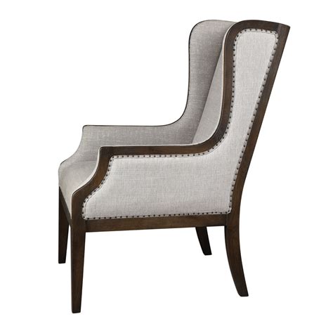 A simple design marked by square volumes, this sophisticated armchair has a retro allure, featuring distinctive armrests that. Florent Taupe-Gray Armchair | Grey armchair, Armchair ...