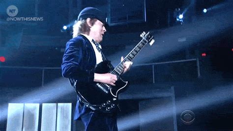 (function(w, d, n, s, t) wn = wn || ; Angus Young GIFs - Find & Share on GIPHY