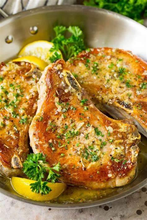 These Baked Pork Chops Are Coated In Garlic And Herb Butter Then Oven