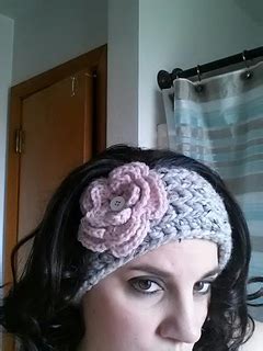 Red heart's roll with it tweed is super soft and squishy. Ravelry: Chunky Ear Warmer pattern by Cari Kessler