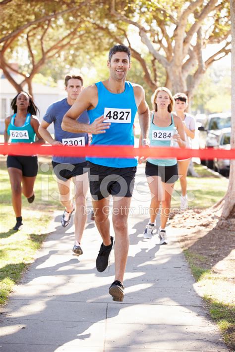 Male Runner Winning Marathon Stock Photo Royalty Free Freeimages