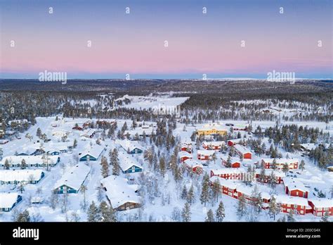 Aerial View Of Snow Capped Forest And Saariselka Winter Tourist Resort