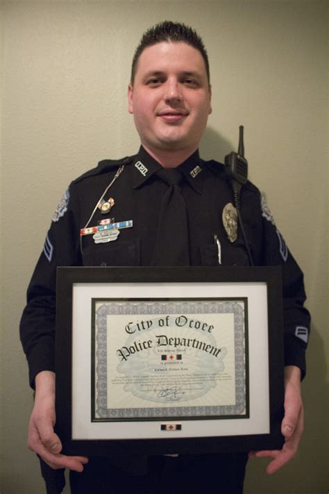 ocoee police officer receives life saving award west orange times and observer