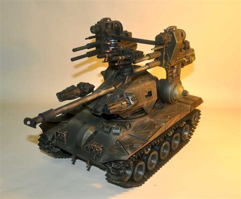 Centurion drone weaponizer figure that converts to cybertronian tank mode in 23 steps and breaks apart into weapon accessories to armor up other figures (each . G.I. Joe Equalizer Tank or is it? - HissTank.com