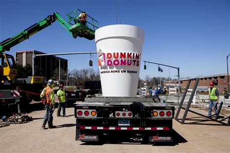 Customers, employees, connoisseurs and executive chefs are all welcome. Giant Dunkin' Donuts Cup Raised At Yard Goats Stadium - Hartford Courant