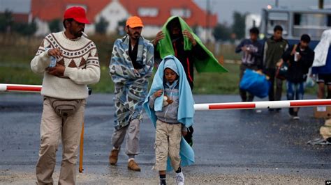 Refugees Arrive At Austrian Border From Hungary