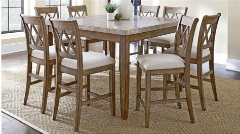 We offer dining tables that will fit four settings all the way up to eight so you can make sure no one gets left out when it's time to eat. Dunedin 9 Piece High Dining Suite - Dining Furniture ...
