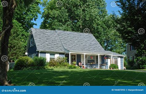 One And A Half Story Home With Porch Swing Stock Image Image Of