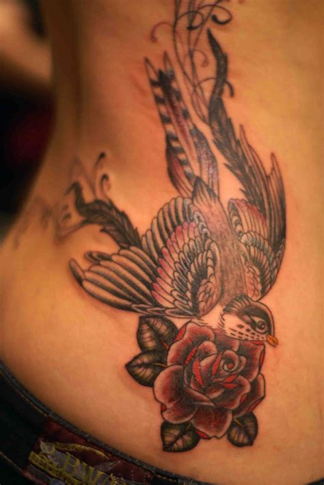 I'll post a better pic tomorrow. bird tattoo on rib cage | Bird Tattoos