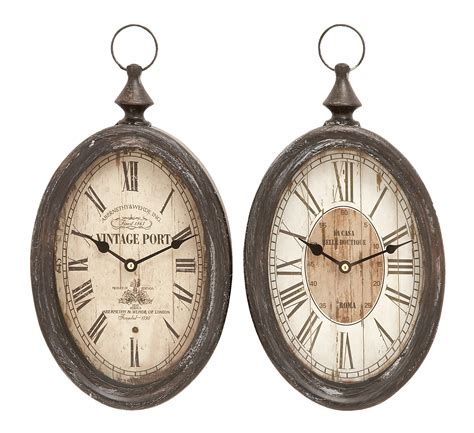 Oval Shape Sophisticated Assorted Metal Wall Clock Set Of 2