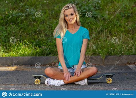 A Lovely Blonde Model Poses Outdoors In A Large City Environment Stock Image Image Of Emotion