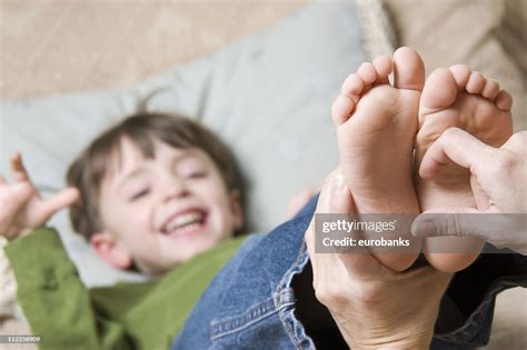 Tickling Feet High Res Stock Photo Getty Images