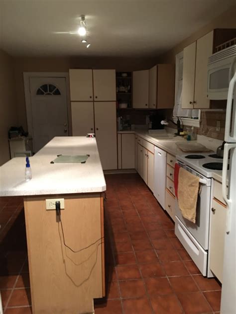 It's not okay to install them over a floating floor. Painting Laminate Kitchen Cabinets in Delmar, Ny - FunCycled