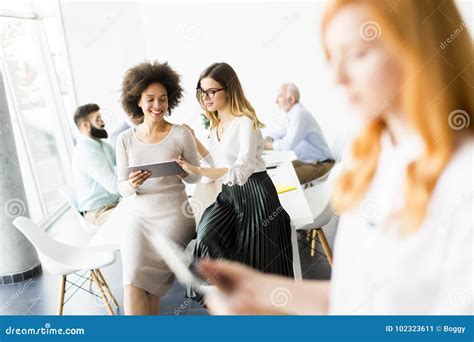 Multiethnic Business Team Working At The Same Office Stock Image