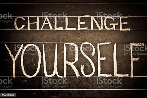 Challenge Yourself Phrase Handwritten On Black Chalkboard Stock