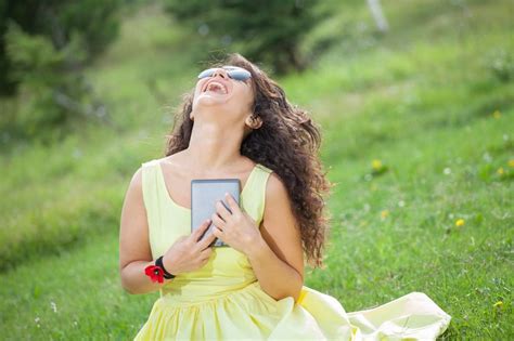 Women Laughing Alone With Tablets Are Having More Fun Than You Avec