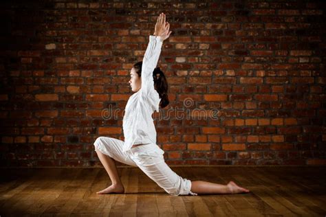 Girl Exercising Yoga Against Brick Wall Stock Image Image Of Horizontal Brick