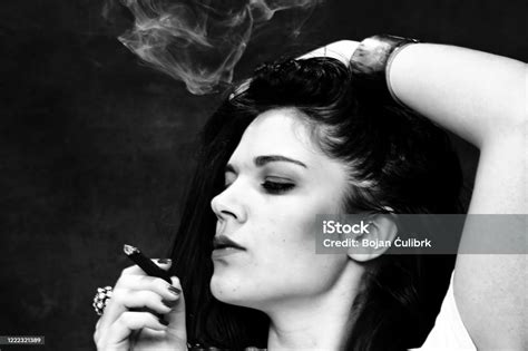Beautiful European Bossy Brunette Girl Smoking A Cigarillo Like A Boss