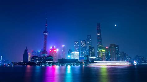Download Wallpaper 1366x768 Night City Buildings Architecture Glow