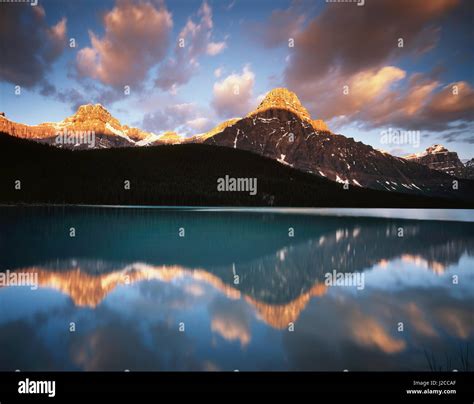 Canada Alberta Banff National Park Mount Chephren Reflects In A Lake