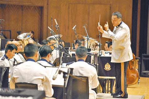 Police Band Music Director Leung Bo Kun Conducts The Police Silver Band