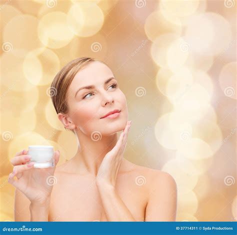 Woman Applying Cream On Her Skin Stock Image Image Of Golden Care 37714311