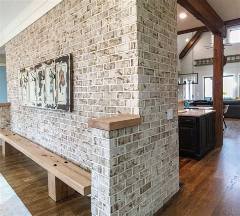 Stylish Entrance To An Open Floor Plan With Brick Entrance Brick