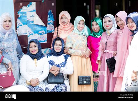 A group of Muslim women wearing traditional clothing, Sulawesi