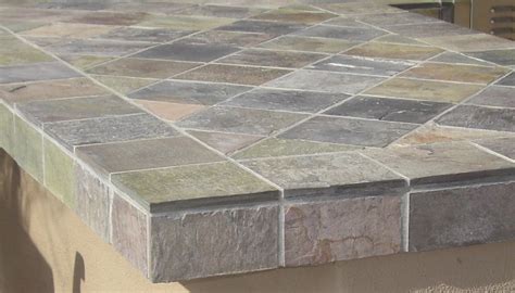 Also, a bar top that is counter height just looks silly. Outdoor bar tile designs | Hawk Haven