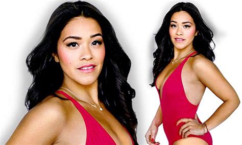 Gina Rodriguez Takes The Plunge In Red Bathing Suit And Strikes Boxing