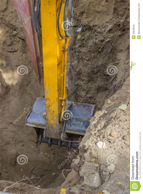 Excavator Arm Digging Deep Hole Seeking Cracked Sewage