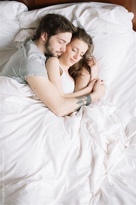 Couple Sleeping Hugging On Pillow By Alberto Bogo For Stocksy United Couple Sleeping Romantic