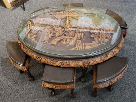 Chinese Oval Coffee Table With Hand Carved King In Palace Scene And Six