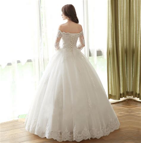 Simple and sleek long sleeve boatneck gown. Off Shoulder Wedding Dresses,Long Sleeve Wedding Dresses ...