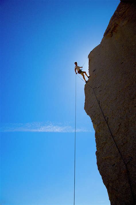 Person Rock Climbing Photograph By Greg Epperson