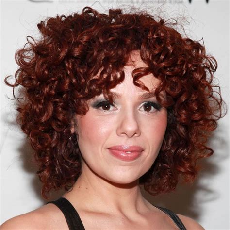 The long curly locks accentuate the impeccable skin and her big eyes, and this hairstyle will look great on women who would like to age with style and dignity. Curly Short Hairstyles for Older Women Over 40,50, 60 ...