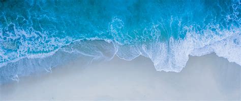 Download Beach Sea Shore Blue Water Sea Waves Aerial View 2560x1080