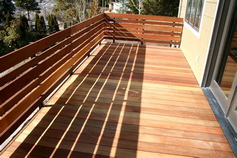 You have to put fewer pieces together to construct the rails. Bogatay Construction, Inc. - Home | Wood deck railing ...