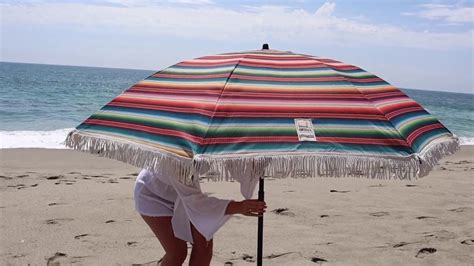 Best Way To Put Your Beach Umbrella In The Sand Youtube