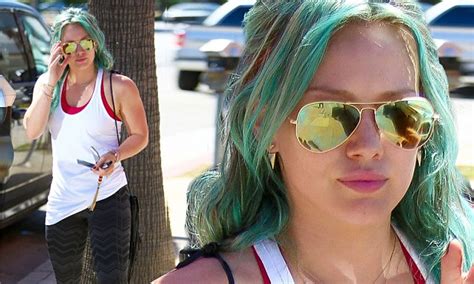 Hilary Duff Looks Sassy In Mirrored Aviators And Green Hair As She Makes Her Way To Spa After