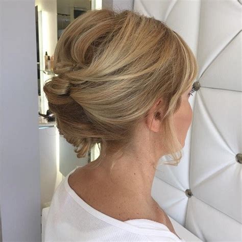Start at the front and work your way around, concentrating on tight spaces in between each pin for the best results. 15 Pretty Updos for Medium Length Hair