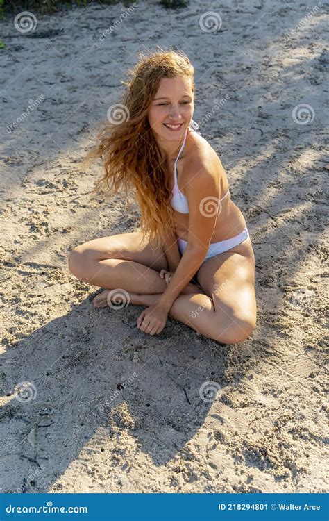 Lovely Blonde Bikini Model Posing Outdoors On A Caribbean Beach Stock Image Image Of Coastline
