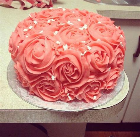 Ruffled Wedding Cake Covered In Roses Easy Weddings