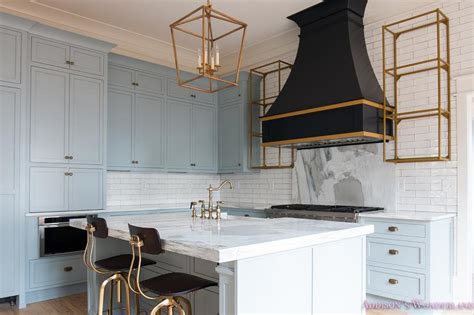 See what our experts had to say to better homes & gardens about picking the perfect color. Gray Kitchen Cabinets with Gold and Black Kitchen Hood ...