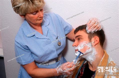 Nurse Shaving Patient Stock Photo Picture And Rights Managed Image