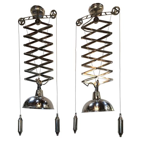 Pair Of Vintage Chrome Pendant Lamps At 1stdibs