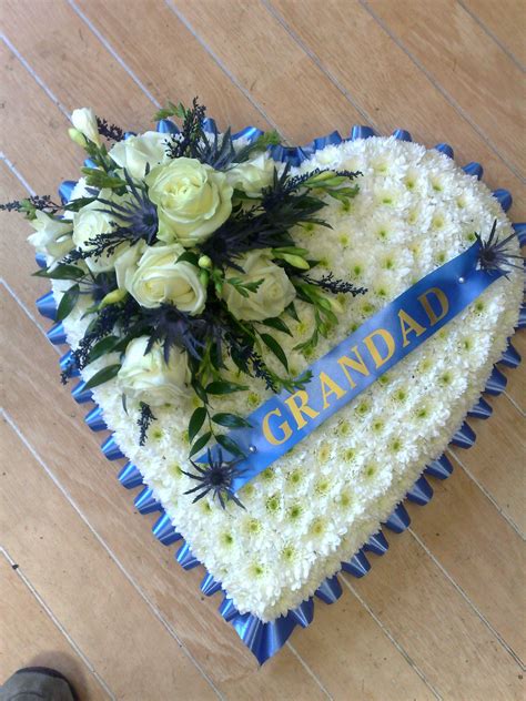 Carnations, daisies, irises, lilies, orchids, roses, sunflowers Open heart funeral arrangement - Bing Images | Funeral ...