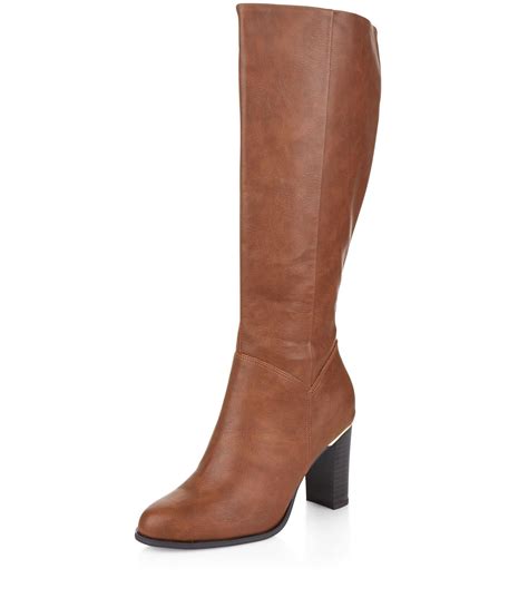 new look tan knee high leather look metal trim block heel boots in brown lyst