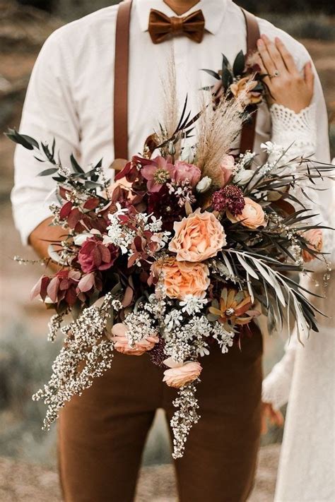 The Instagram Page For Instagram Com Features An Image Of A Bride And Groom Holding Their Bouquet